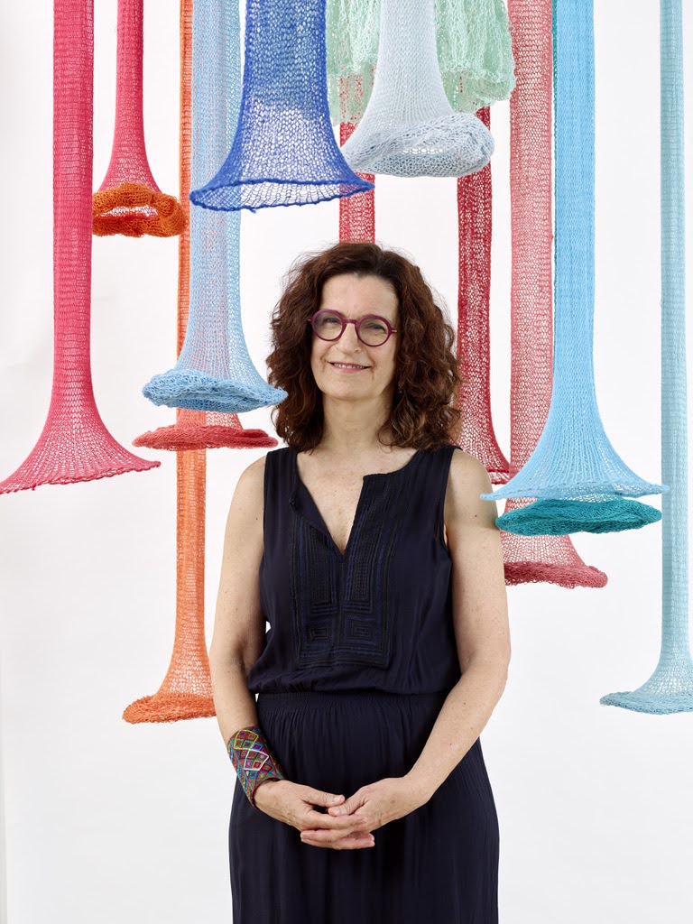 Portrait of fiber artist Evelyn Politzer in her studio